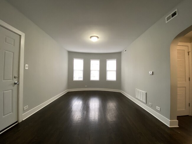 Open living area with large windows - 2 Bedroom - 2128 N Sawyer