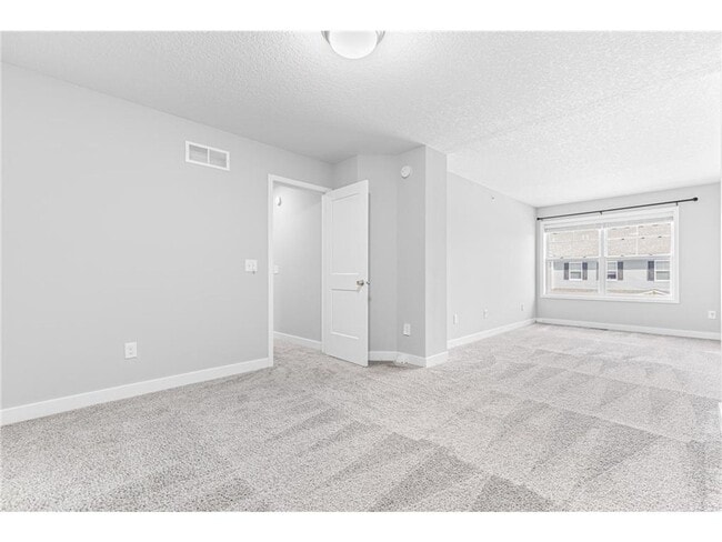 Building Photo - Spacious 3BR Townhome with Loft & Attached 2-Car Garage - Available NOW!
