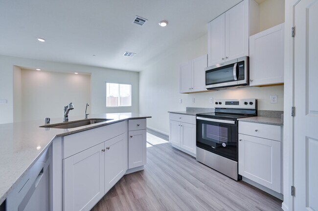 Building Photo - NW 3 Bedroom Townhouse!! Gated Community Pool!! 2 Car Garage!!! No Carpet downstairs.