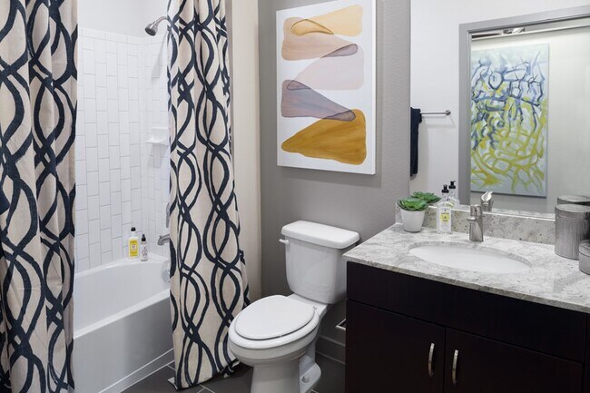 Building Photo - Spacious Than You Think & Richly Featured