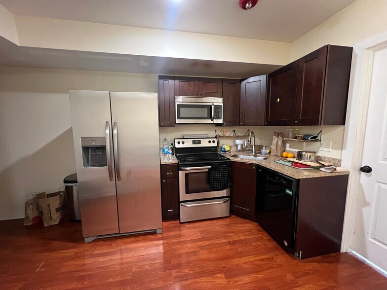 Living room and kitchen - 1704 Cecil B Moore Ave