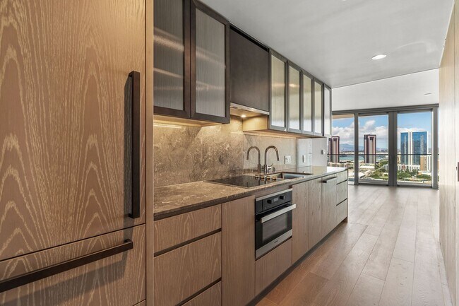 Building Photo - Koula 2209 — Modern Studio with Partial Oc...