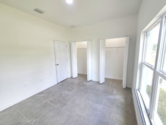 Building Photo - Brand New 2/2/1-South Lehigh Acres