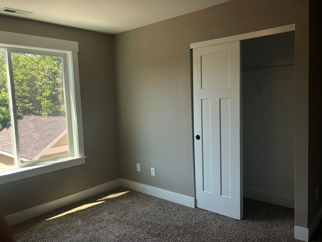Building Photo - Beautiful New Home with Garage and Yard! A...