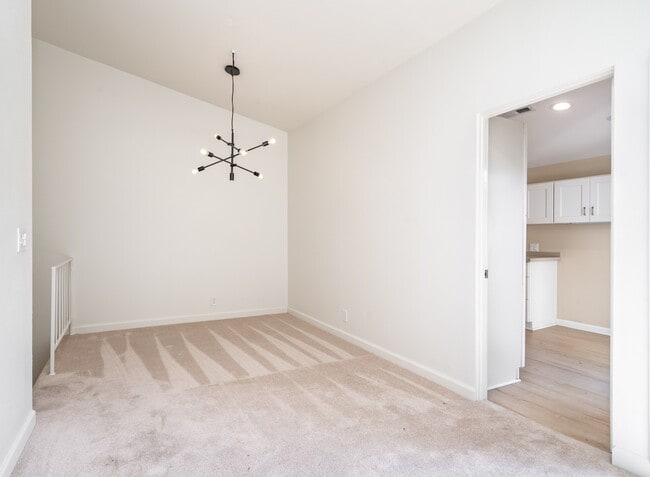 Building Photo - Beautifully Remodeled Tri-Level Condo With...