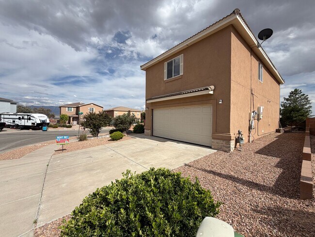 Building Photo - 4 Bedroom Home Available Near McMahon Blvd NW & Universe Blvd NW!