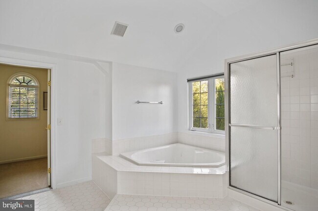 Building Photo - Spacious 4-Bedroom Home with Lake Views & Finished Basement