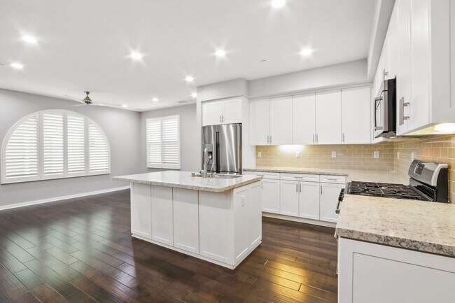 Building Photo - For Lease – 4 Bed / 3 Bath Townhome with 2-Car Garage