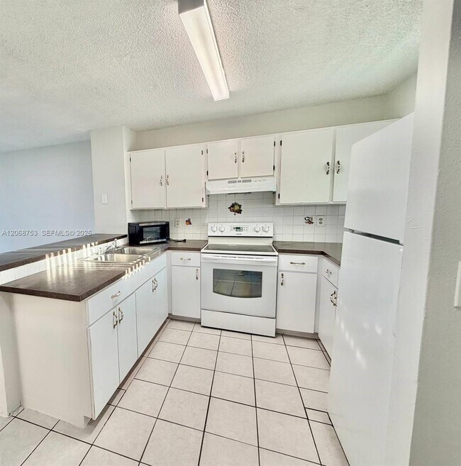 Building Photo - 8750 N Sherman Cir