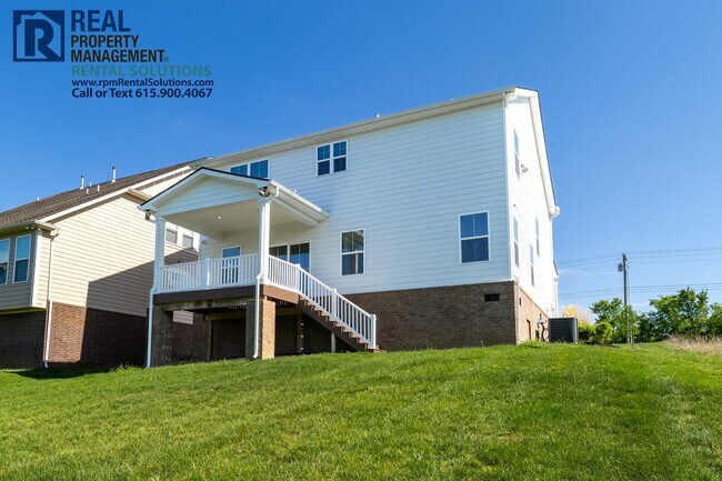 Building Photo - Great 4 bd 2.5 ba with attached garage and large deck!