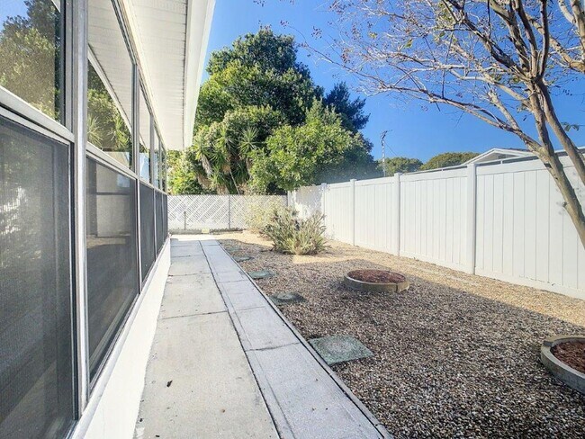 Building Photo - 3/2/1 1412 Sq. Ft. home with renovated kit...