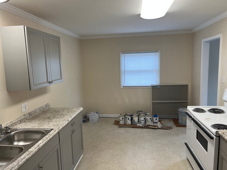 Kitchen and view of dining area. - 307 Maple St