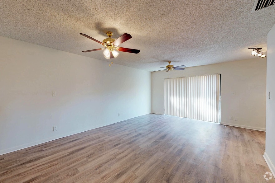 2BR, 1BA - 930SF - Living Room - Lakeside Villas