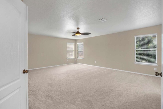 Building Photo - "Spacious 4-Bedroom Sanctuary with 3 Full ...