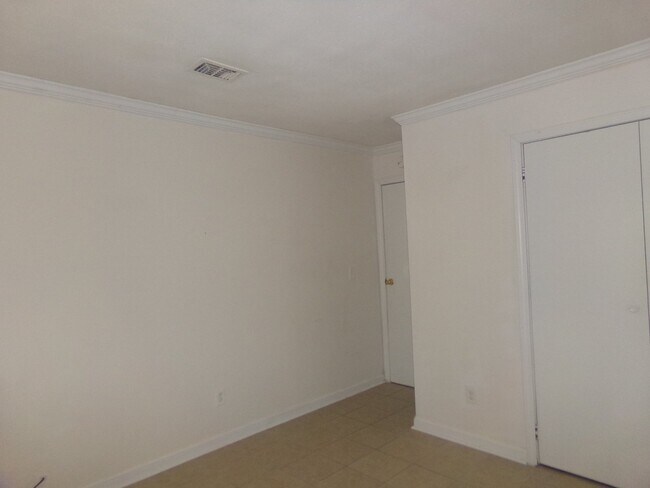 Building Photo - 2BR/1BA Milton Duplex with Huge Fenced Backyard, Tile Flooring Throughout & Convenient Access to ...