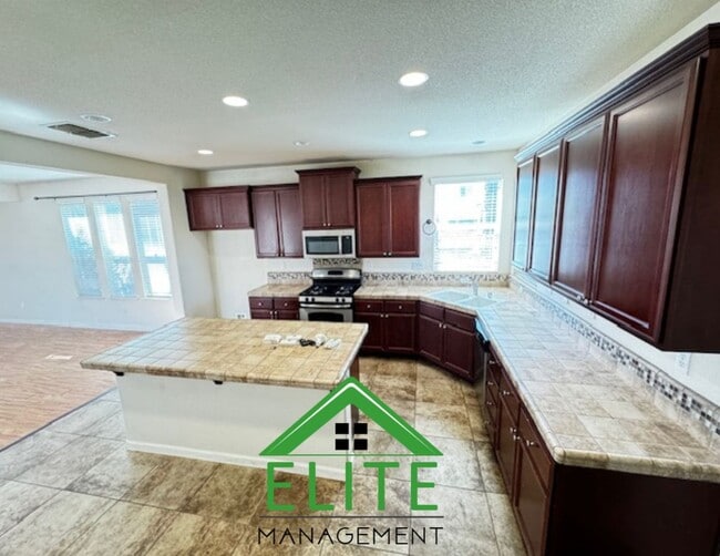 Building Photo - **SOLAR PANELS AND FORMER MODEL HOME!!**