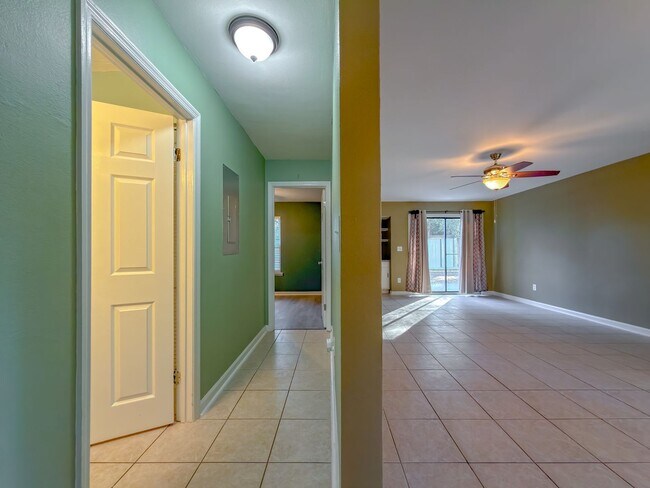 Building Photo - LOVELY & Modern NW 2/1 w/ New Flooring & Huge Privacy Fenced Yard that Inc Lawn Maintenance! Avai...