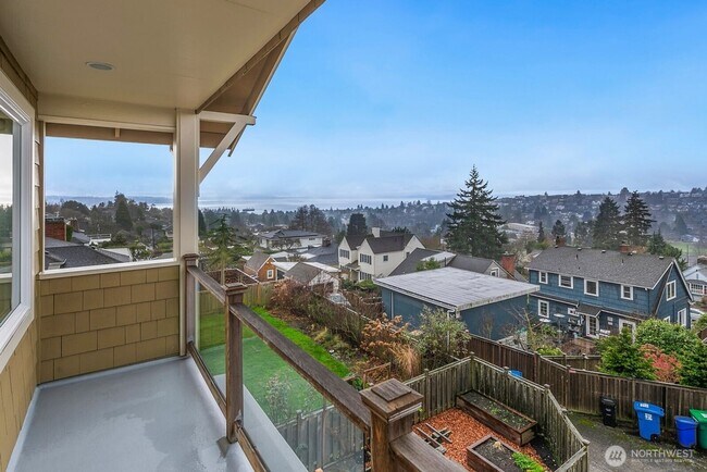 Building Photo - Light-Filled Magnolia Home with Spectacular Northwest Views