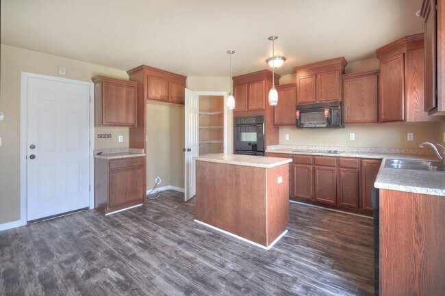 Building Photo - 7687 Manistique Dr