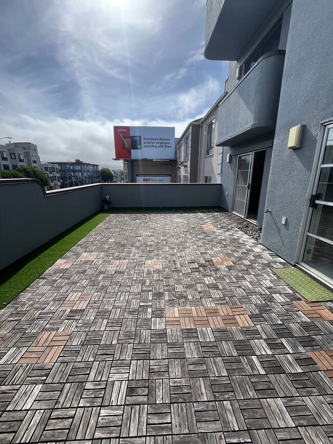 Building Photo - Beautiful 2BR/1BA with Large Private Patio, Parking & Shared Rooftop Deck in Marina