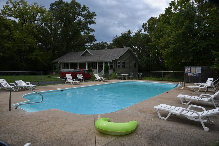 Office is at 406 Kays Lane, Hollister, MO 65672. It is Just Down Hill & Below Pool - 428 Kays Ln