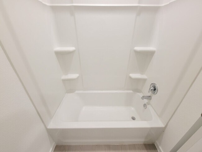 Building Photo - This lovely single-level home showcases a spacious open floorplan shared between the kitchen, din...