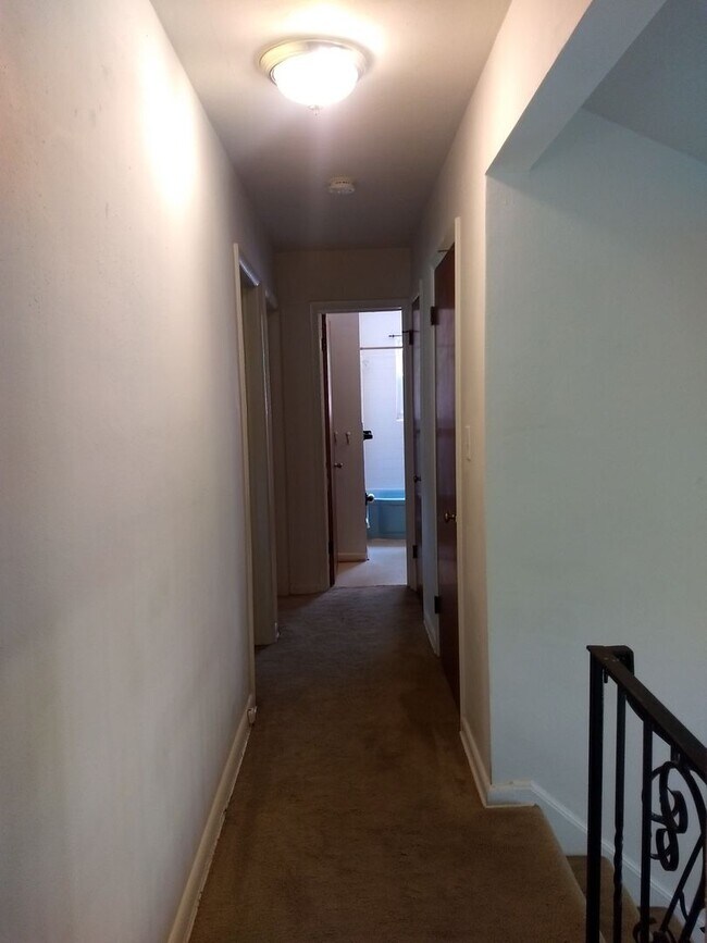 Building Photo - TRI-LEVEL HOME WITH GARAGE AND LARGE FENCE...