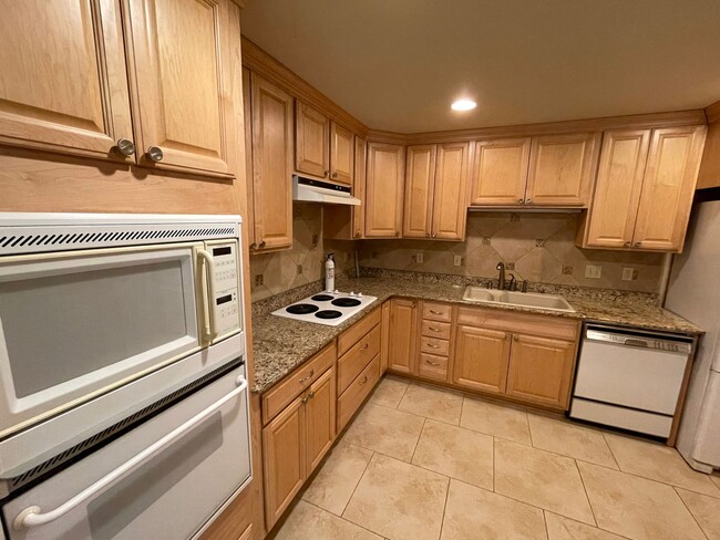 Building Photo - Comfortable Raleigh Park Plaza Condo with ...