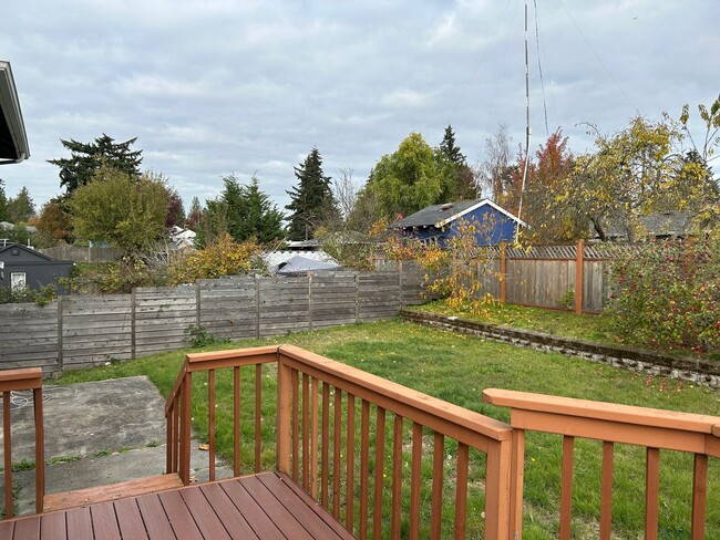 Building Photo - Fenced Backyard in our Charming 3+BR Corne...