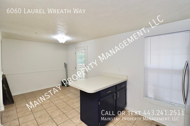 Building Photo - 6060 Laurel Wreath Way
