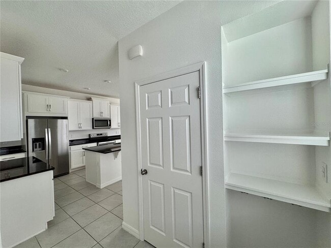 Building Photo - 8973 Matriarca Aly