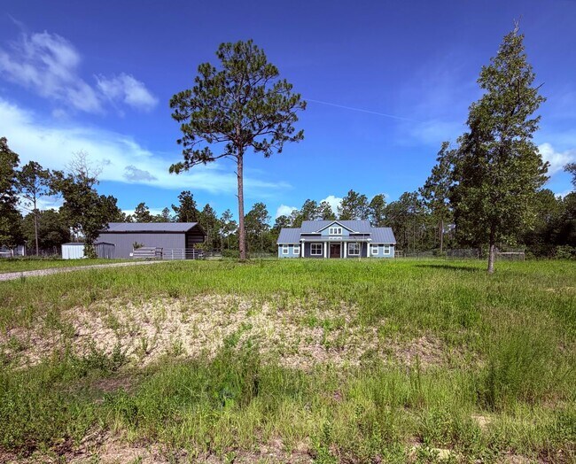 Building Photo - Gated 10-Acre Luxury Retreat with 40x60 Shop & Barn!