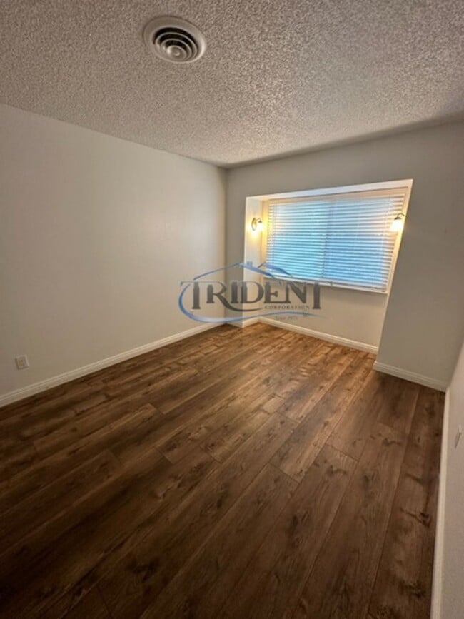 Building Photo - 3 bedroom, 2 ½ bath townhouse, located in The Grove gated community