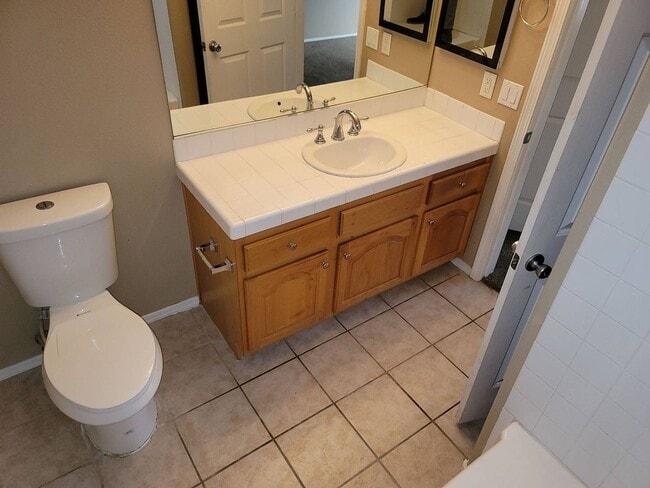 Building Photo - 2 story condo with 1 bedroom loft, 2 bathrooms and a 1 car attached garage.