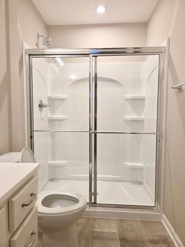 Building Photo - Exquisite brand new condo w/everything! Ground floor, no stairs, attached garage