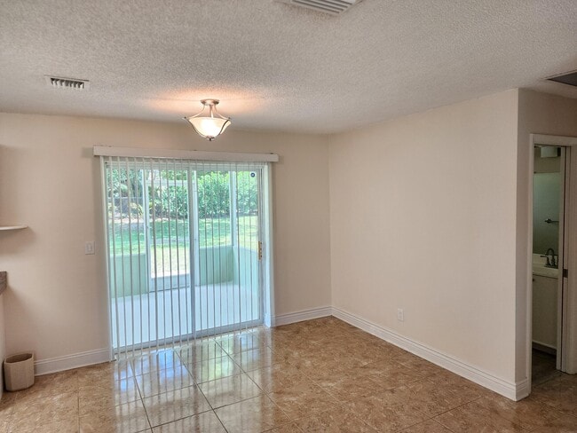 Building Photo - 1680 SE Minorca Ave