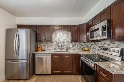 Building Photo - **FIRST MONTH FREE**!!  Immacutate, FULLY FURNISHED 2-Bed - 1 Bath Duplex with Garage & Fenced Ya...