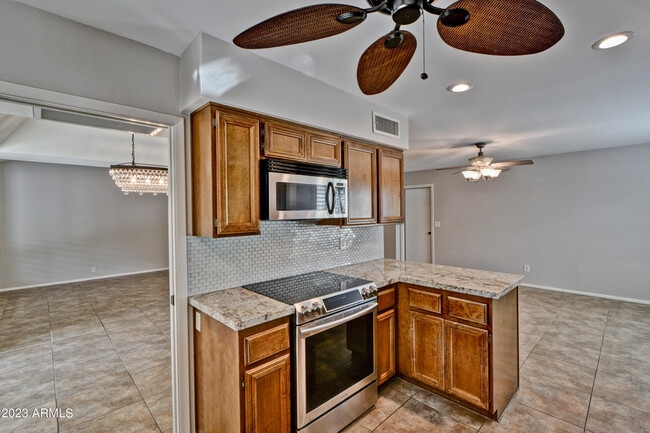 Building Photo - 6747 E Aire Libre Ln