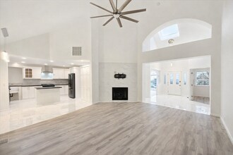 Building Photo - Executive 3 Bed Home with 3 Car Garage & Private Fenced Yard