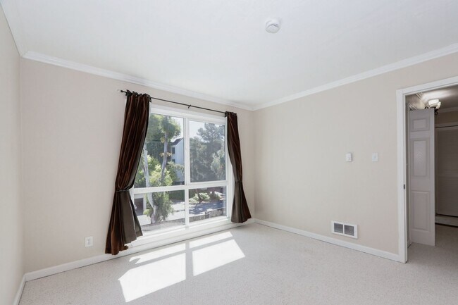 Building Photo - 1BR/1BA Pet-Friendly Top-Floor Condo with Bonus Room & Resort-Style Amenities | San Mateo | YouTu...