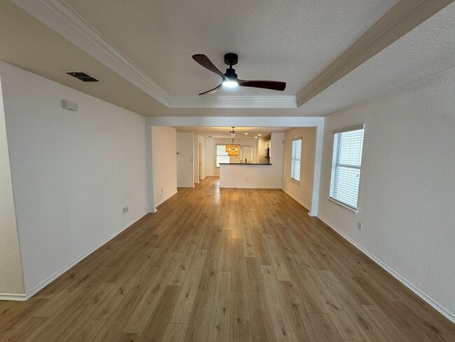 Building Photo - CUTE ONE STORY FEATURING WOOD STYLE VINYL ...