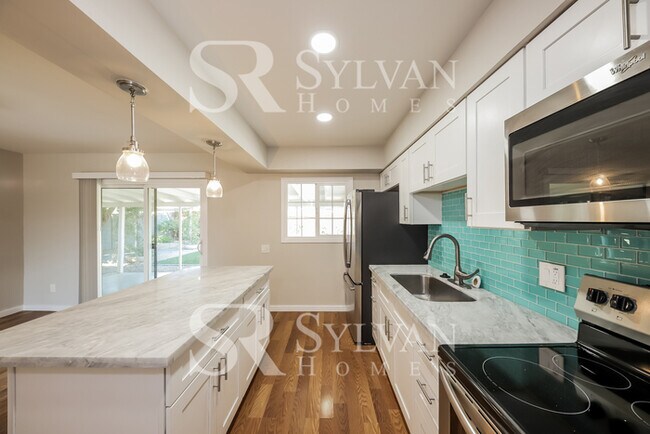 Building Photo - This lovely home is ready for your personal touch!