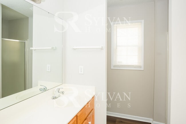 Building Photo - This home exudes a cheerful and welcoming charm!