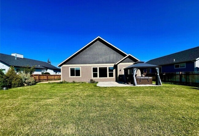 Building Photo - Charming 4-Bedroom Home with Spacious Lawn in Bozeman, MT!