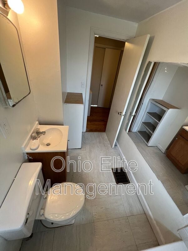 Building Photo - 1310 E 25th Ave