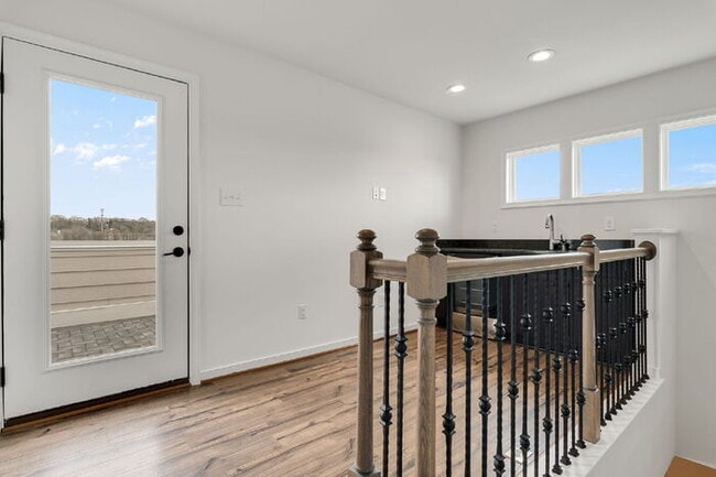 Building Photo - Modern End-Unit Townhome in Rocketts Landing with an Incredible Rooftop Terrace