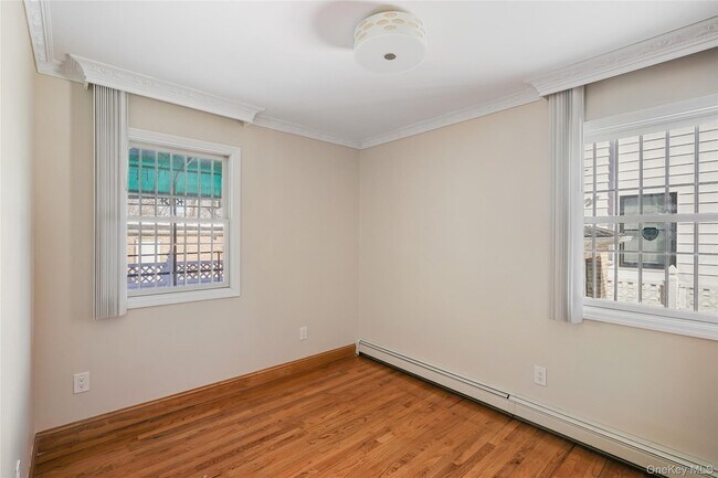 Building Photo - 214-27 38th Ave