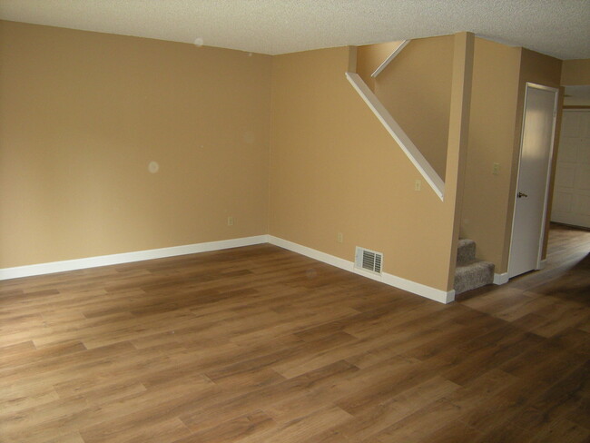 Building Photo - Condo unit featuring updated kitchen with ...