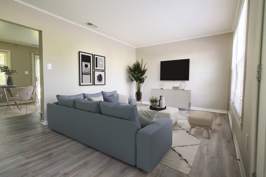 Slate Living Room with Vinyl Plank - Meadowfield Townhomes of Rochester Hills