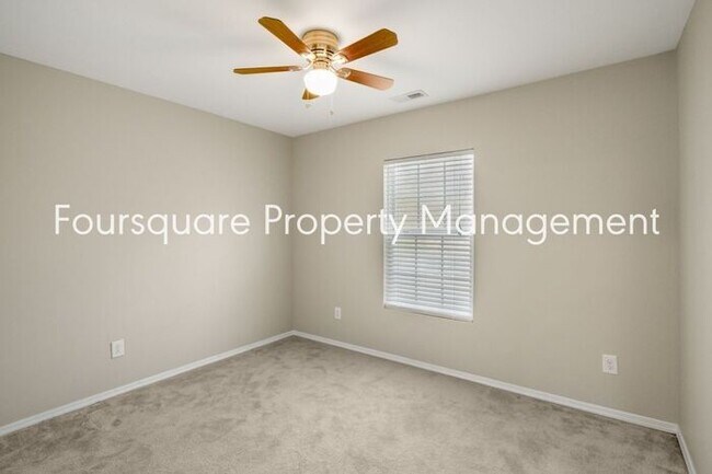 Building Photo - Charming Townhome with Open Layout, Back Patio & One-Car Garage – Near RTP, RDU & Everyday Conven...